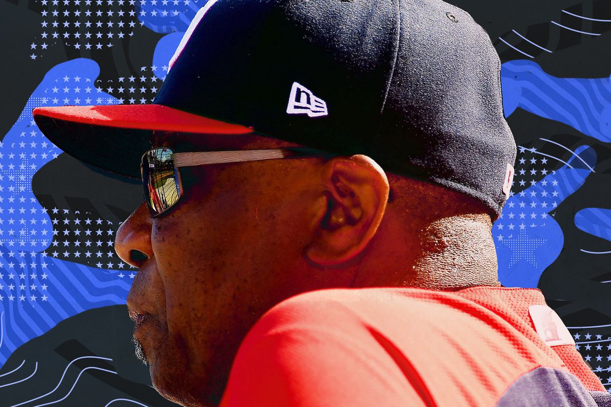 Dusty Baker in profile wearing sunglasses while he was managing the Nationals.