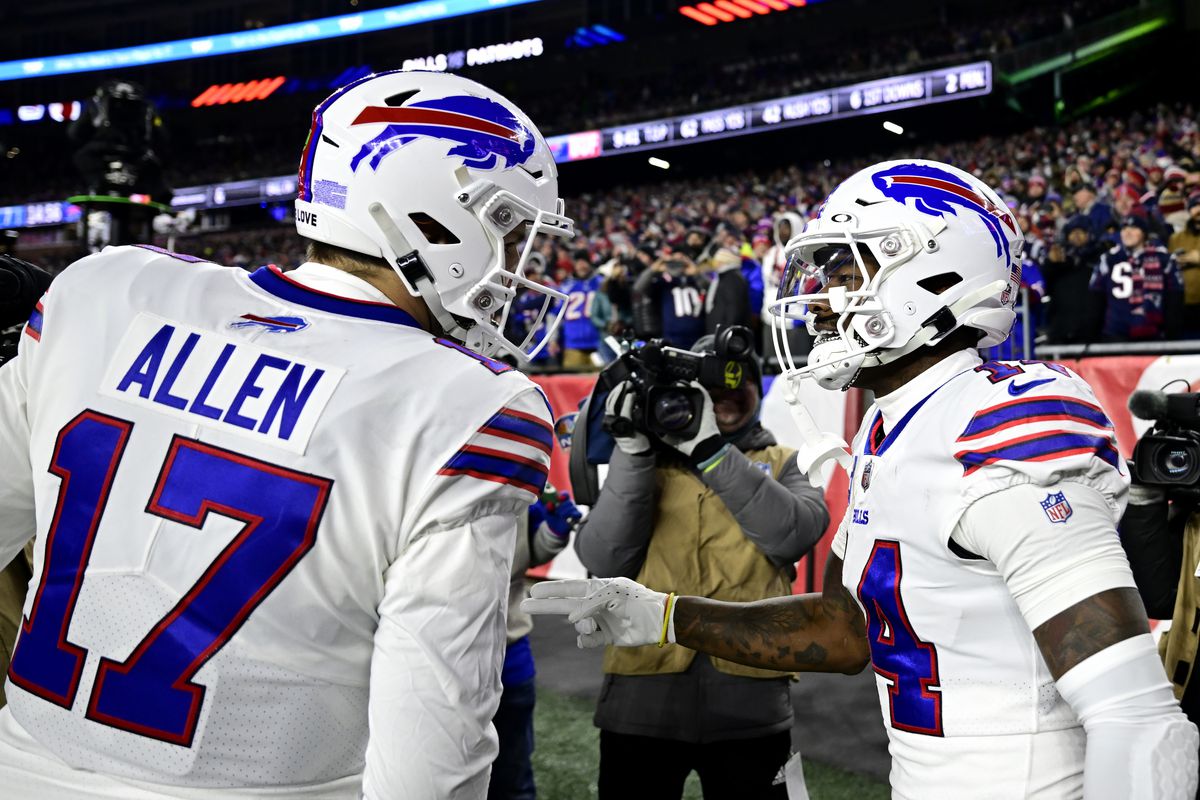 FOXBOROUGH, MASSACHUSETTS - DECEMBER 01: Wide receiver Stefon Diggs #14 of the Buffalo Bills celebrates after catching a first half touchdown pass from quarterback Josh Allen against the New England Patriots at Gillette Stadium on December 01, 2022 in Foxborough, Massachusetts.