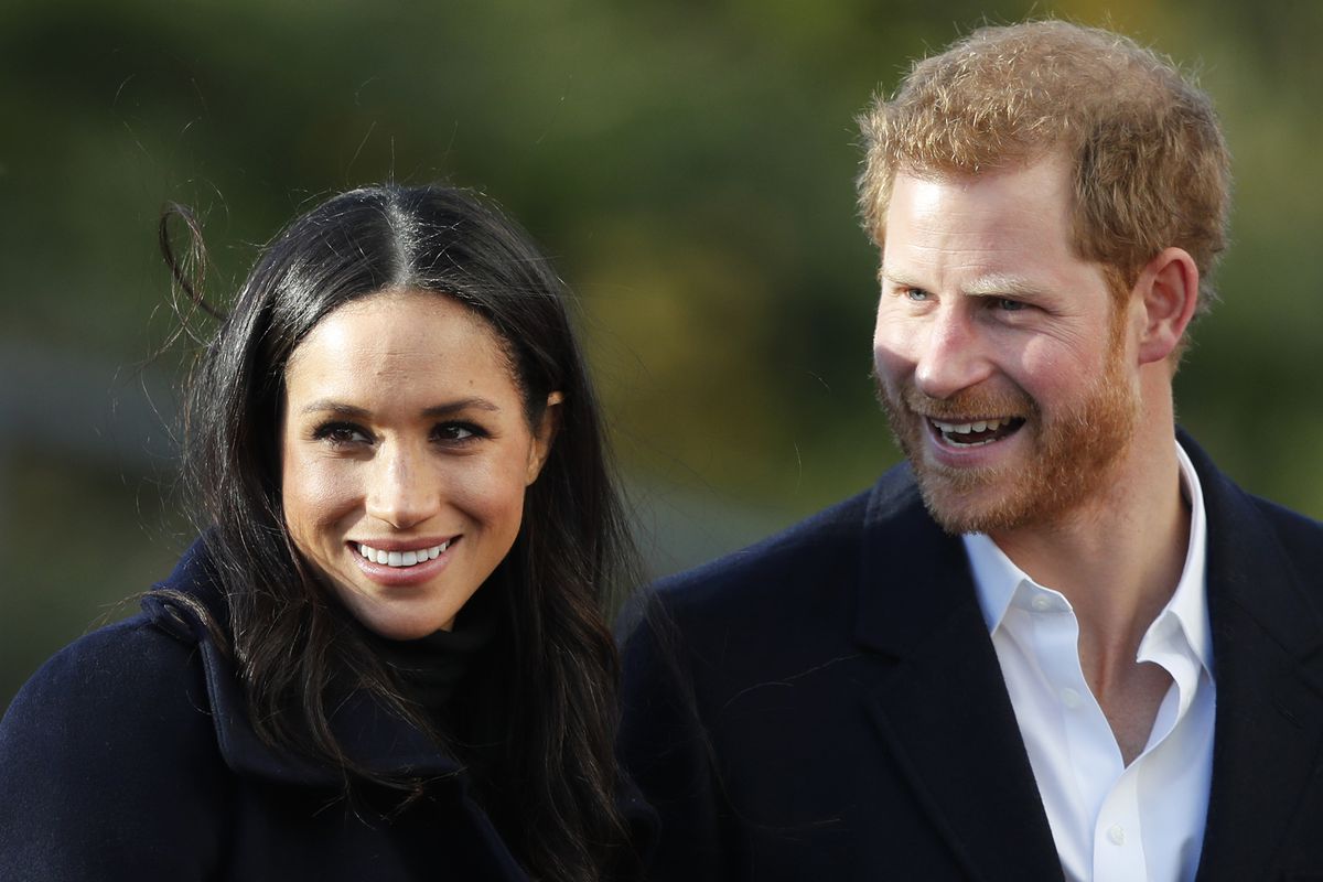 FILE - In this Dec. 1, 2017 file photo, Britain’s Prince Harry and his fiancee Meghan Markle arrive at Nottingham Academy in Nottingham, England. The child of Meghan Markle and Prince Harry will be seventh in the line of succession to the British throne,