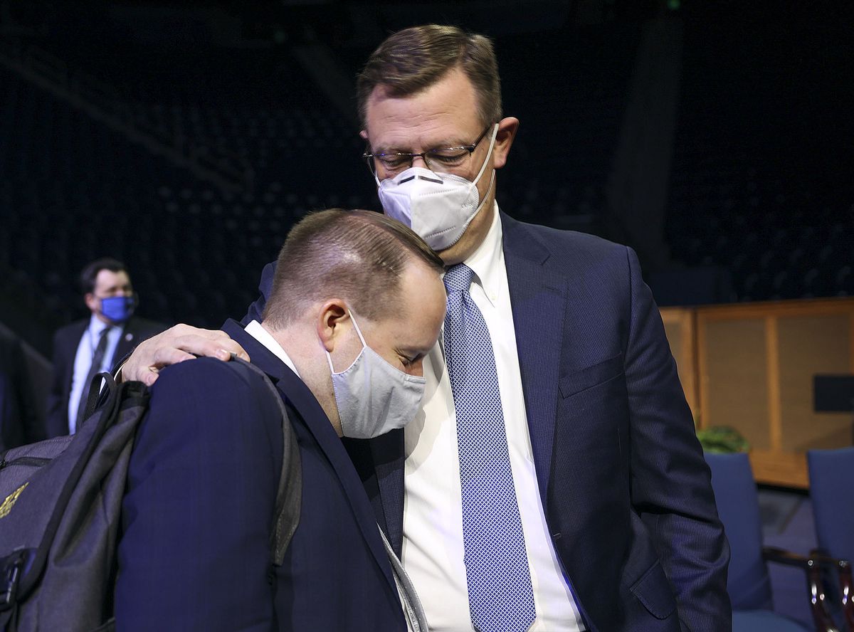 Clark G. Gilbert, General Authority Seventy of The Church of Jesus Christ of Latter-day Saints and Church Education Commissioner, embraces Nathan Relken after delivering a BYU devotional speech at the Marriott Center in Provo Tuesday, February 8, 2022.