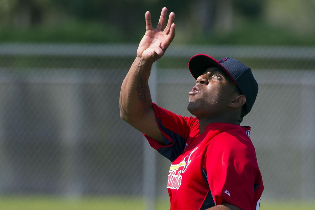 Perhaps Oscar Taveras could boost his defensive reputation by bringing a glove with him to the outfield.