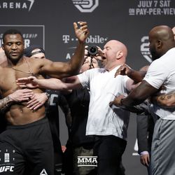 Francis Ngannou is separated from Derrick Lewis at UFC 226 weigh-ins.