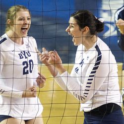 BYU middle hitter Amy Boswell, right, celebrates with outside hitter Hannah Robison during an NCAA volleyball playoff game against UNLV in Provo on Saturday, Dec. 3, 2016. BYU swept UNLV 3-0 to advance to the Sweet 16.