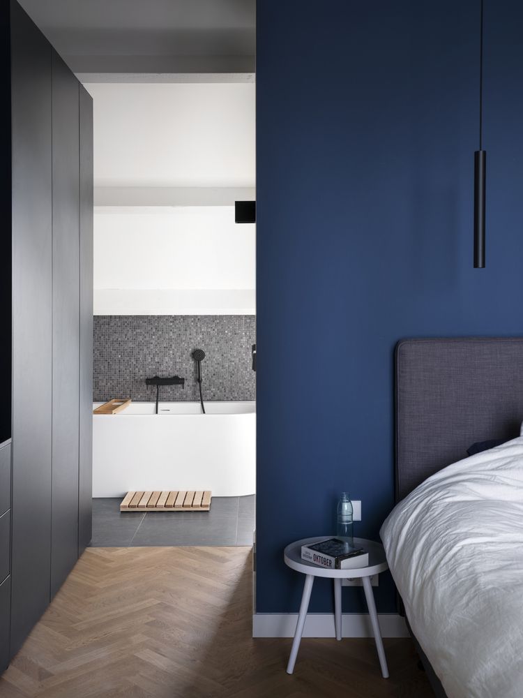 Bedroom with blue accent wall
