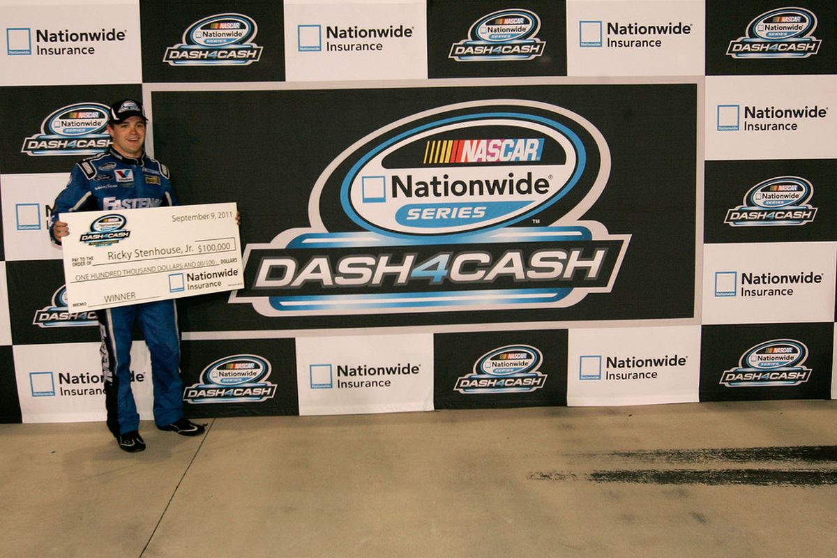 Ricky Stenhouse Jr. celebrates winning the Dash 4 Cash award in the NASCAR Nationwide Virginia 529 College Savings 250 at Richmond International Raceway on Sept. 9.
