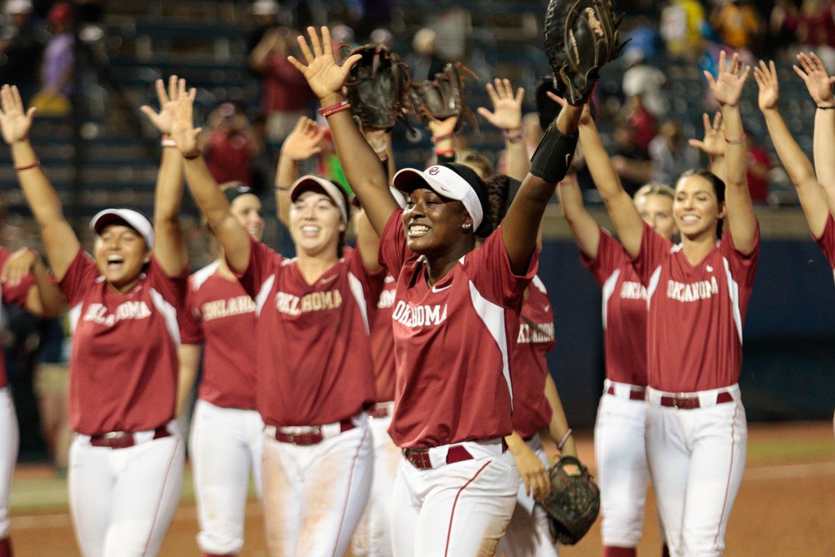 Shay Knighten celebrates with the Sooners after recording a double play