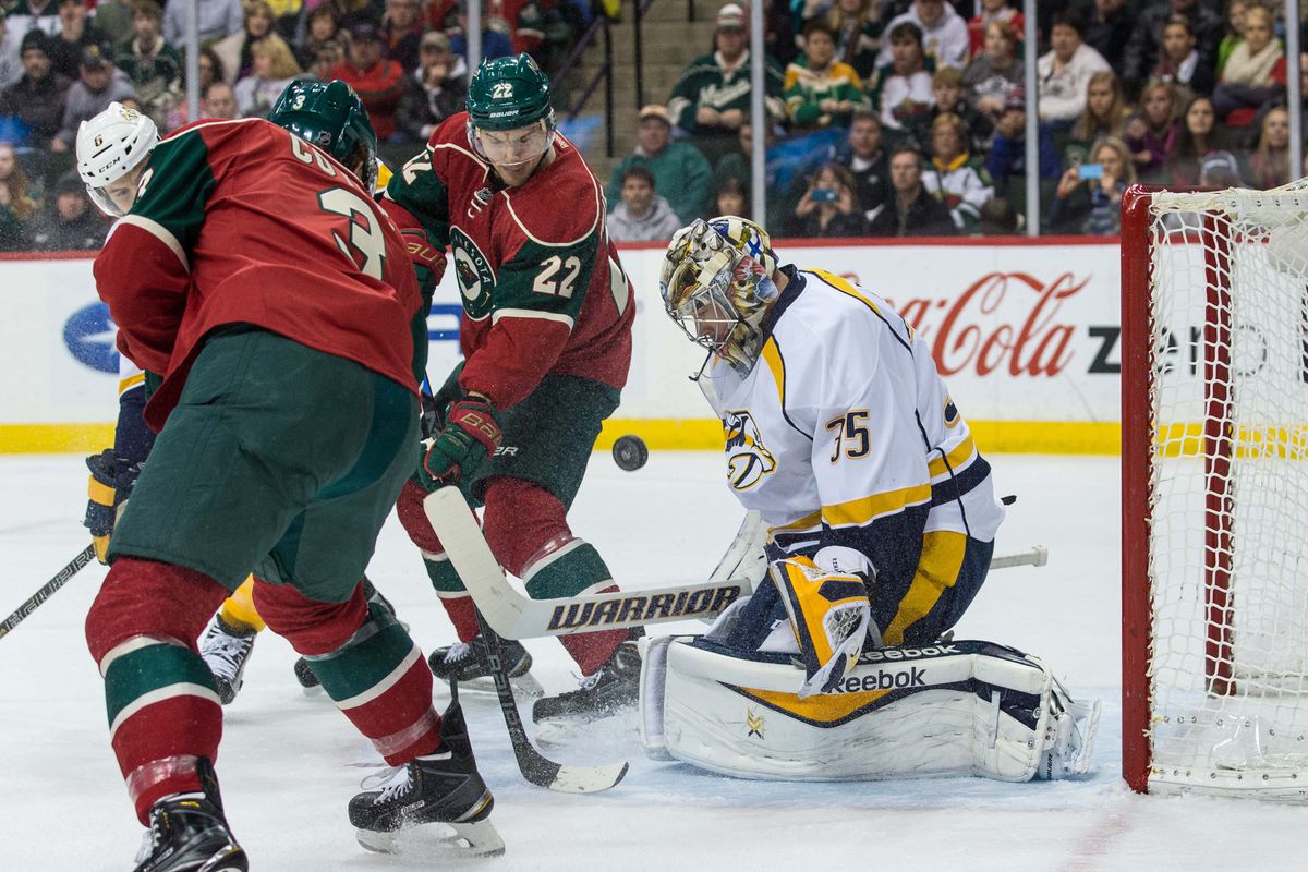 The Doghouse twins harass Pekka Rinne.  The Wild hope to see more of this tonight.