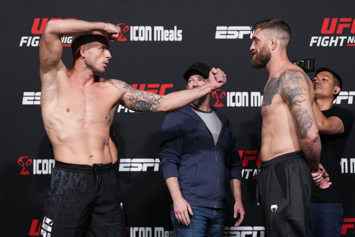 Opponents Krzysztof Jotko of Poland and Gerald Meerschaert face off during the UFC weigh-in at UFC APEX on April 29, 2022 in Las Vegas, Nevada.