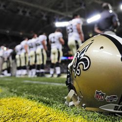 Aug 8, 2014; St. Louis, MO, USA; New Orleans Saints listen to the national anthem before a game against the St. Louis Rams at Edward Jones Dome. Mandatory Credit: Jeff Curry-USA TODAY Sports