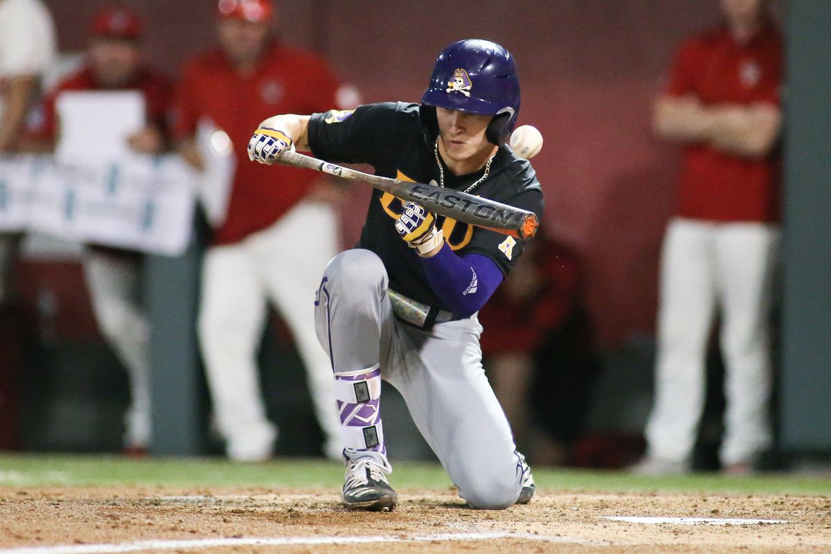East Carolina Pirates outfielder Bryson Worrell bunts foul in the college baseball game between the East Carolina Pirates and the NC State Wolfpack on April 26, 2022, on Doak Field at Dail Park.