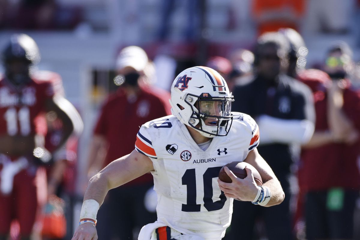 Bo Nix of the Auburn Tigers runs with the ball against the South Carolina Gamecocks during a game at Williams-Brice Stadium on October 17, 2020 in Columbia, South Carolina. The Gamecocks won 30-22.