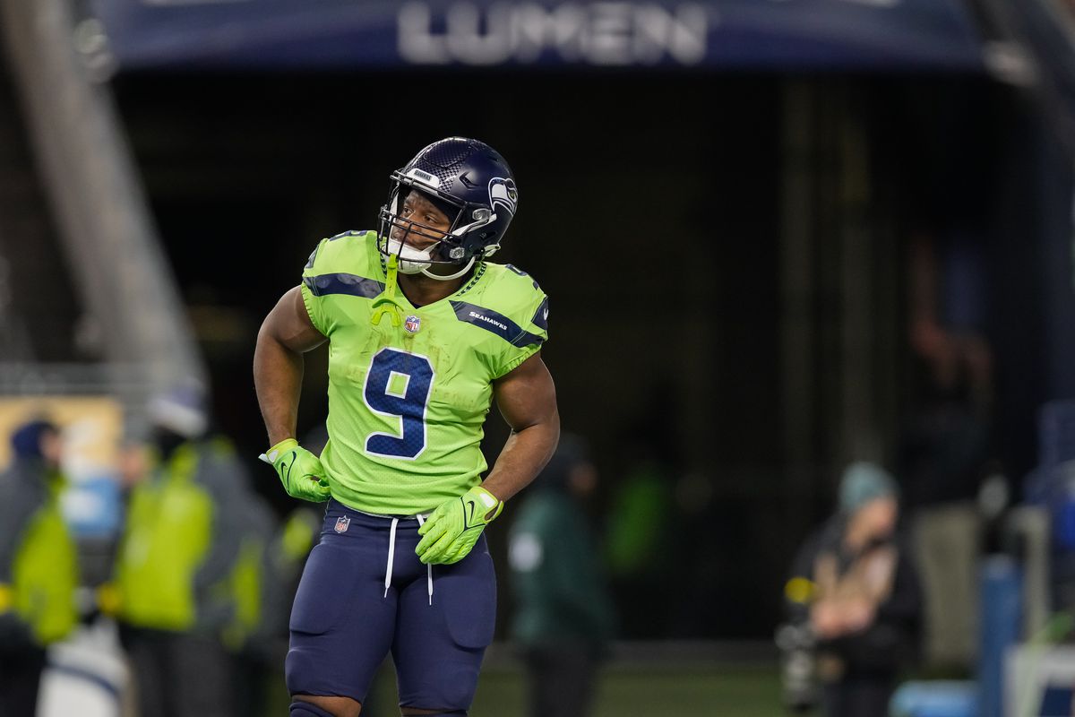 Kenneth Walker III #9 of the Seattle Seahawks looks on during the third quarter of a game against the San Francisco 49ers at Lumen Field on December 15, 2022 in Seattle, Washington.