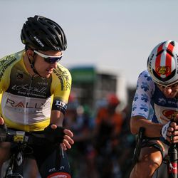 Race leader Robert Britton, a Canadian with Rally Cycling, and King of the Mountain Jacob Rathe, an American with Jelly Belly-Maxxis, talk before the start of Stage 4 of the Tour of Utah in South Jordan on Thursday, Aug. 3, 2017.
