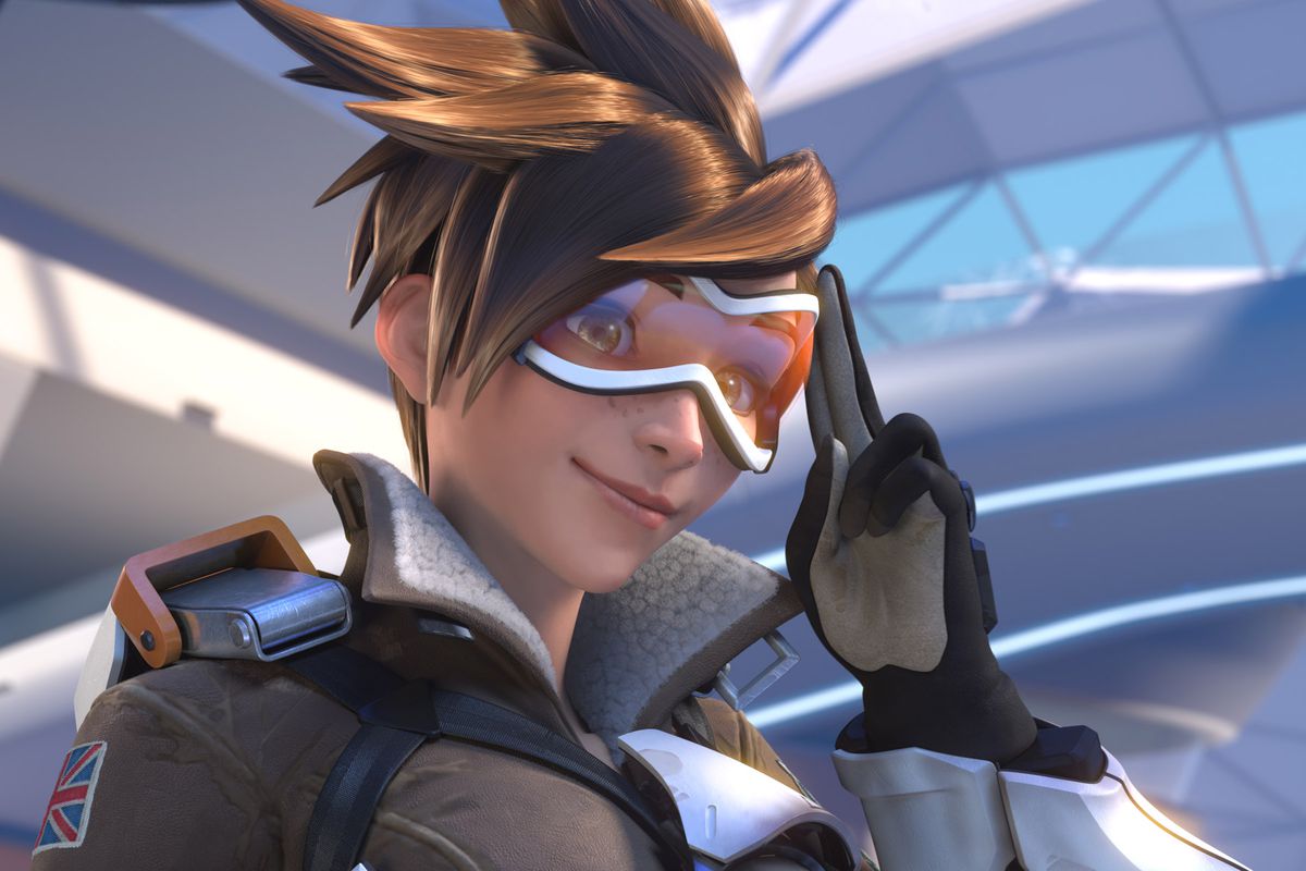 Tracer saluting to a young buy as seen in Overwatch’s cinematic debut trailer