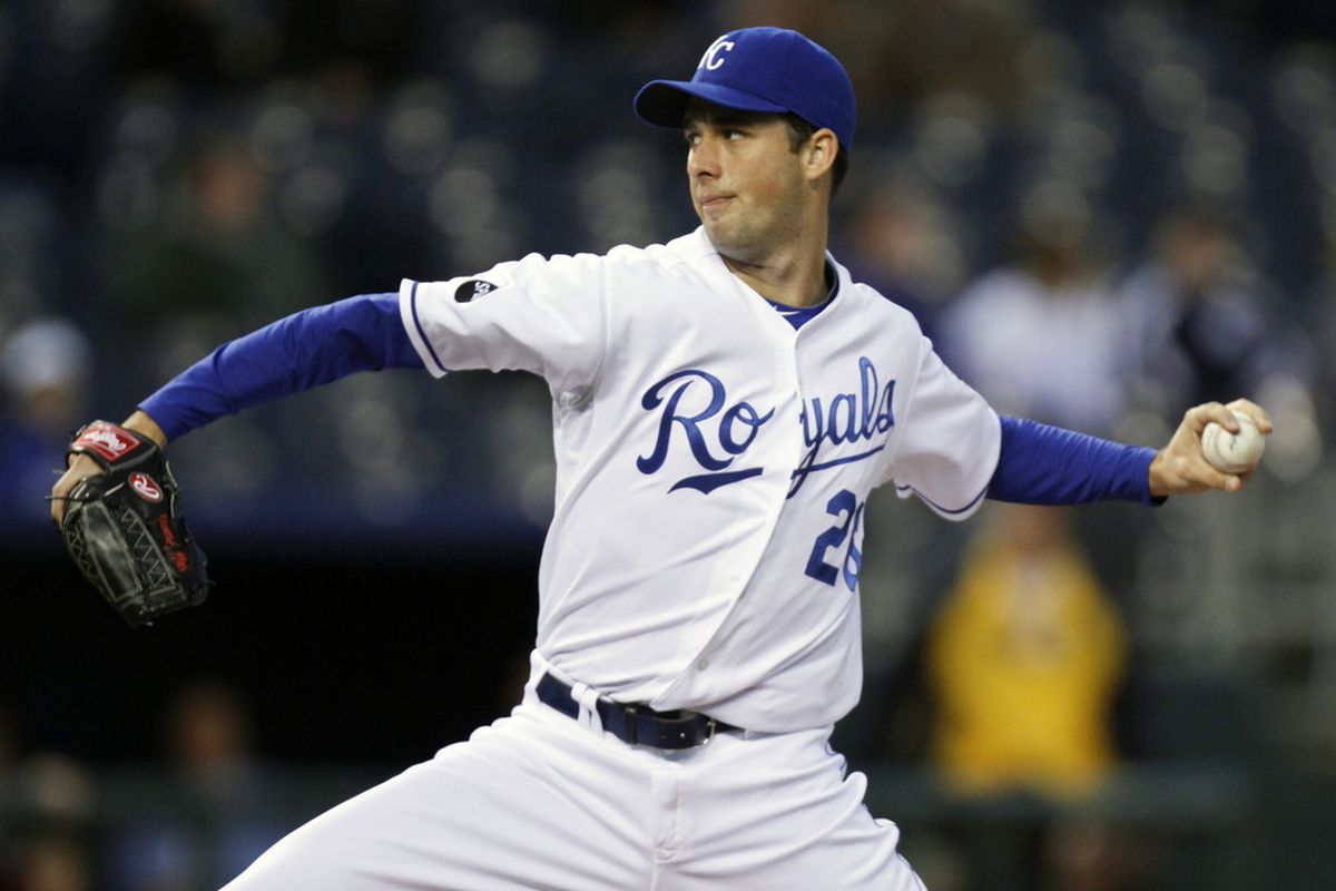 KANSAS CITY, MO - SEPTEMBER 15:  Starting pitcher Jeff Francis #26 of the Kansas City Royals throws during a game against the Chicago White Sox at Kauffman Stadium on September 15, 2011 in Kansas City, Missouri. (Photo by Ed Zurga/Getty Images)