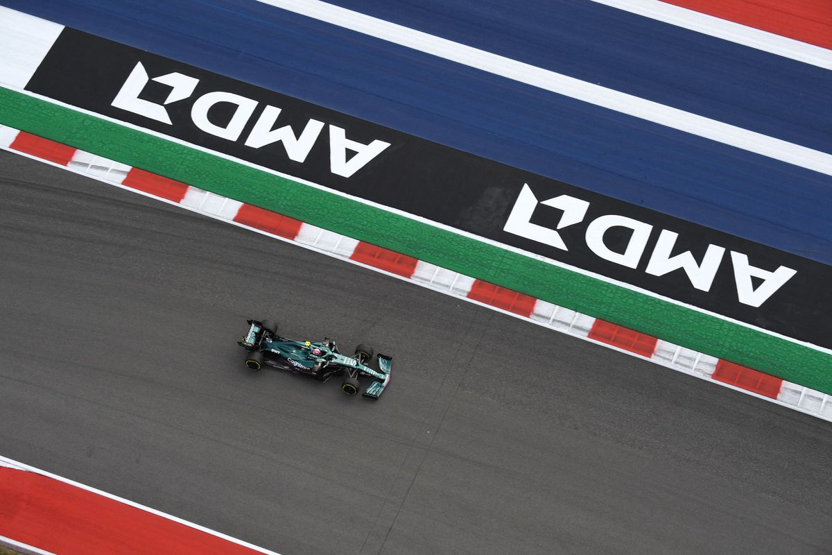 In this aerial image, Aston Martin’s German driver Sebastian Vettel races during the third practice session at the Circuit of The Americas in Austin, Texas, on October 23, 2021, ahead of the Formula One United States Grand Prix.