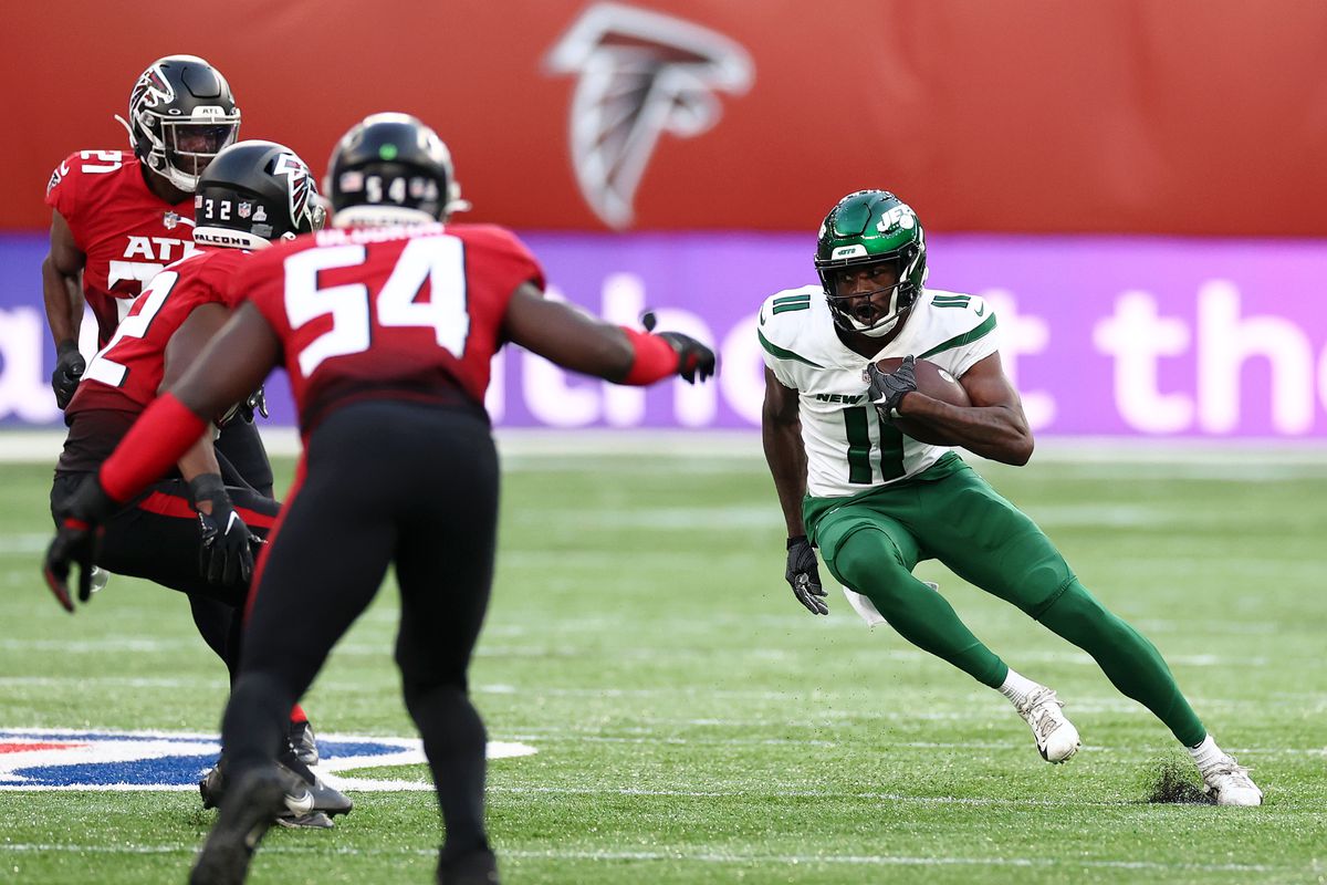 Denzel Mims #11 of the New York Jets runs with the ball during the NFL London 2021 match between New York Jets and Atlanta Falcons at Tottenham Hotspur Stadium on October 10, 2021 in London, England.