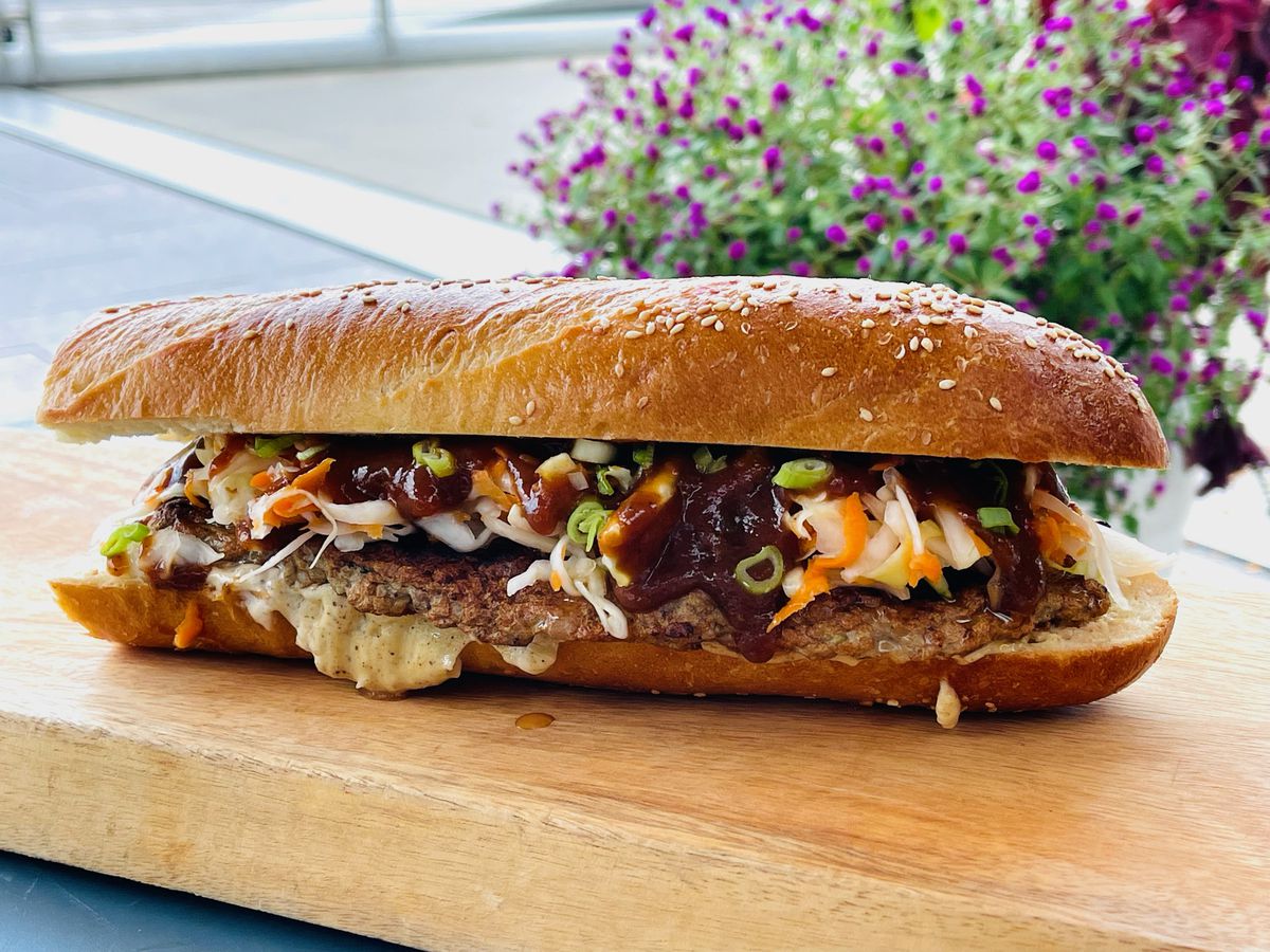 A jerk chicken sausage sandwich from Bammy’s will be available at Grazie Grazie on Friday, September 3 