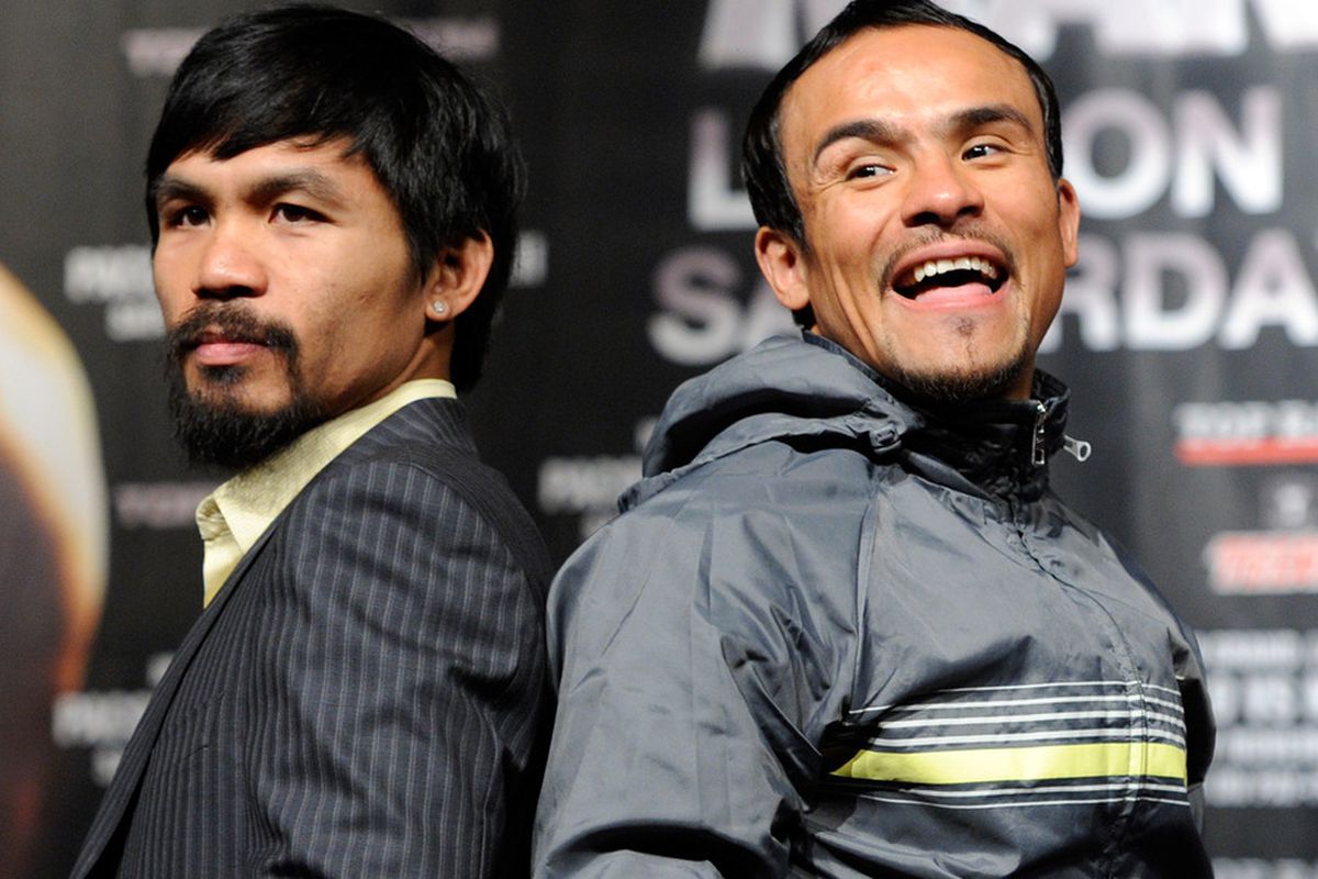 Manny Pacquiao and Juan Manuel Marquez appear to be headed toward a fourth fight on December 8. (Photo by Ethan Miller/Getty Images)