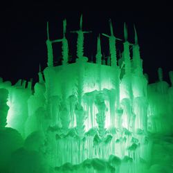 An Ice Castle is lit up at Utah’s Soldier Hollow Resort in Midway Tuesday, Dec. 29, 2015. The acre-sized, all-ice structure features waterfalls, slides, caves and tunnels, along with a fantastical light show set to music.