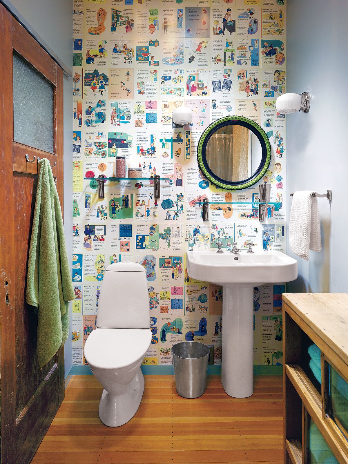 Colorful illustrated wallpaper to update an old bathroom.