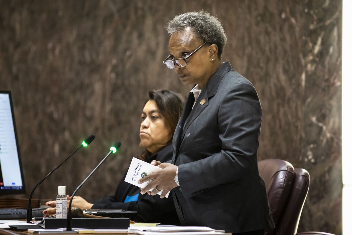 Mayor Lori Lightfoot presiding at Wednesday’s Chicago City Council meeting. In her hands, she’s holding a booklet of the Council’s “Rules of Order and Procedure” — rules she too often flouts, according to 22 aldermen who sent her a letter of complaint on Thursday, a day after a Council meeting adjourned abruptly, leaving some major business unfinished.