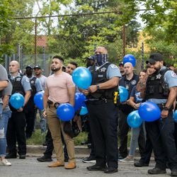Chicago police officers, supporters and community members come together for a vigil and balloon release for Officer Ella French at 63rd Street and Bell Avenue in West Englewood on  Monday, Aug. 9, 2021. 