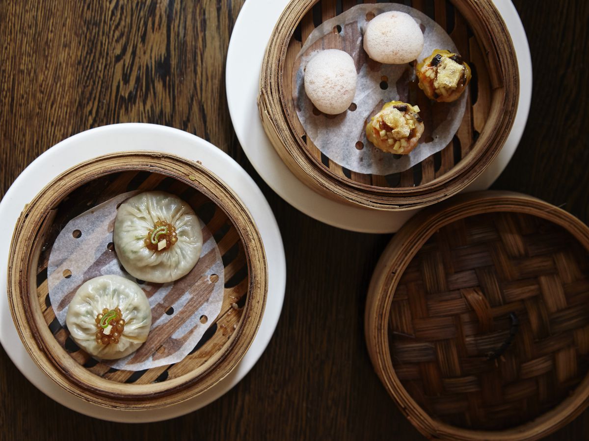 Dim sum at Michelin-starred A. Wong, the Chinese tasting menu restaurant in Victoria: xiao long bao and har gow served in bamboo baskets.