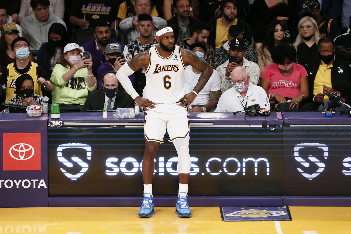 LeBron James #6 of the Los Angeles Lakers waits to enter the game during a game at the STAPLES Center on October 24, 2021 in Los Angeles, California.&nbsp;