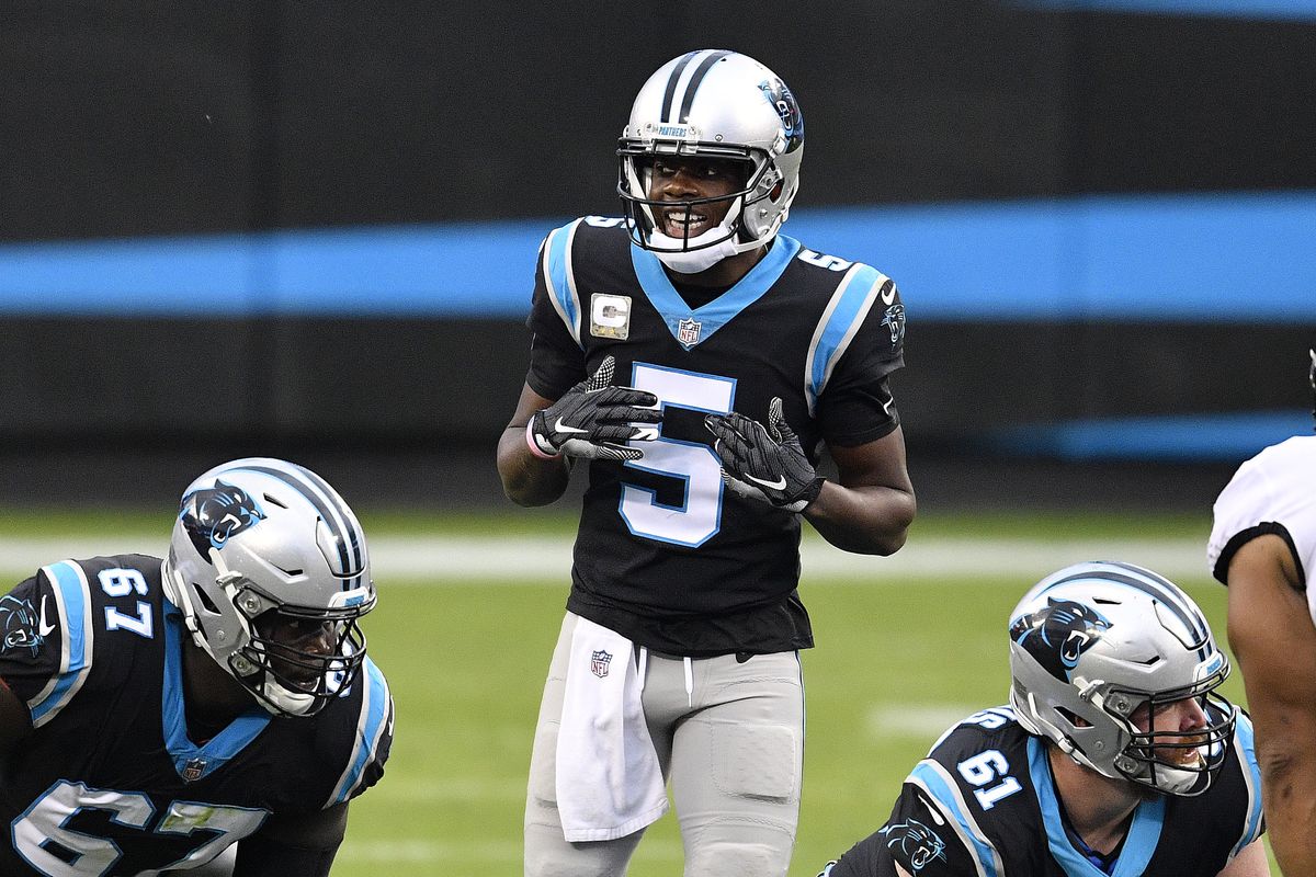 Teddy Bridgewater #5 of the Carolina Panthers signals to his team during their NFL game against the Tampa Bay Buccaneers at Bank of America Stadium on November 15, 2020 in Charlotte, North Carolina.