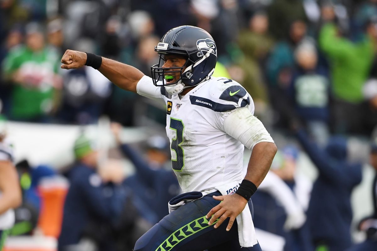 Seattle Seahawks quarterback Russell Wilson reacts after a 58 yard touchdown run by running back Rashaad Penny in the fourth quarter at Lincoln Financial Field.