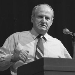 BYU head football coach LaVell Edwards speaks at Cottonwood High School in January 1990.