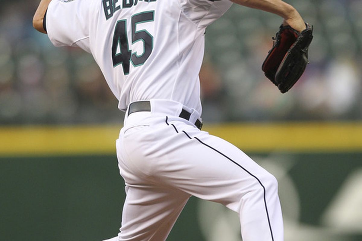 SEATTLE - JUNE 15:  Starting pitcher Erik Bedard #45 of the Seattle Mariners pitches against the Los Angeles Angels of Anaheim at Safeco Field on June 15, 2011 in Seattle, Washington. (Photo by Otto Greule Jr/Getty Images)