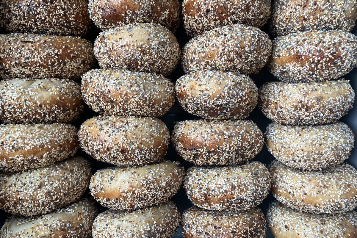 Several rows of everything bagels.