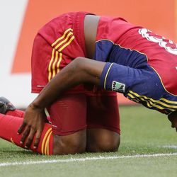 Real Salt Lake Olmes Garcia is upended and injured against Charleston during the U.S. Open Cup in Sandy on Wednesday, June 12, 2013. RSL won 5-2 in extra time.