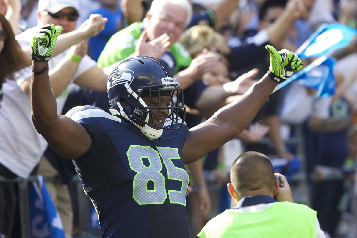 SEATTLE, WA - SEPTEMBER 16: Anthony McCoy #85 of the Seattle Seahawks celebrates scoring a touchdown during a game against the Dallas Cowboys at CenturyLink Field on September 16, 2012 in Seattle, Washington. (Photo by Stephen Brashear/Getty Images)