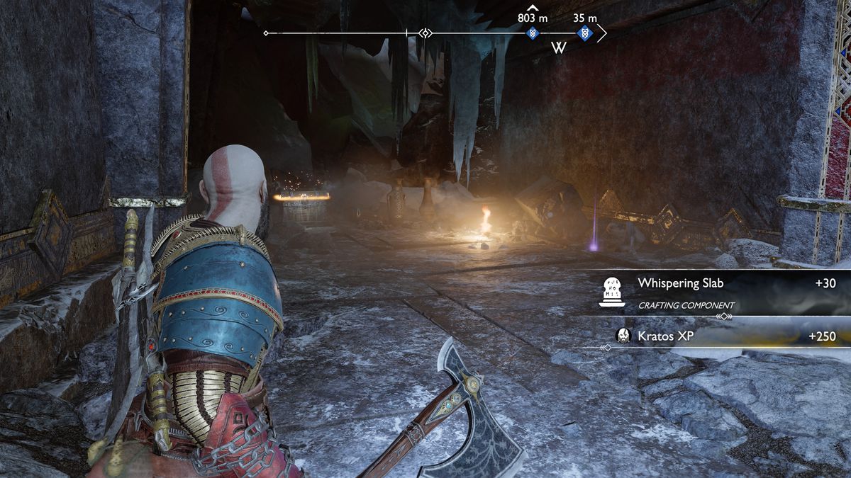 Kratos grabs an Artifact in God of War Ragnarok