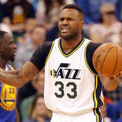 Utah Jazz forward Trevor Booker (33) reacts after getting a foul called on him in the second half of an NBA regular season game against the Golden State Warriors at the Vivint Arena in Salt Lake City, Wednesday, March 30, 2016.