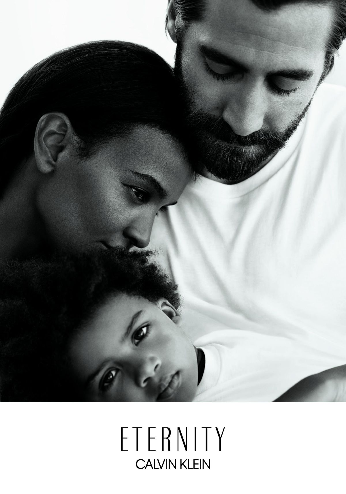 Jake Gyllenhaal, Liya Kedebe, and four-year-old actress Leila in an advertisement for Calvin Klein Eternity fragrance.