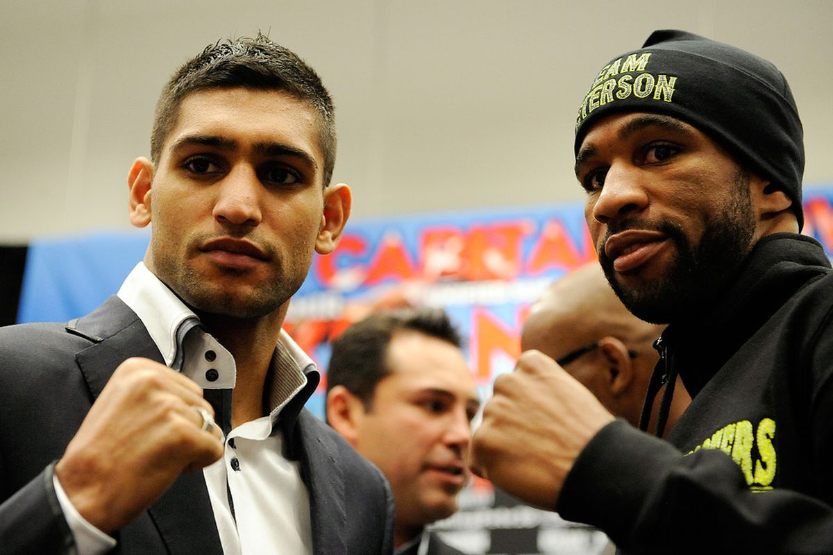 Amir Khan and Lamont Peterson will work with a crew of pretty experienced judges and a veteran referee tomorrow in Washington, DC. (Photo by Patrick McDermott/Getty Images)