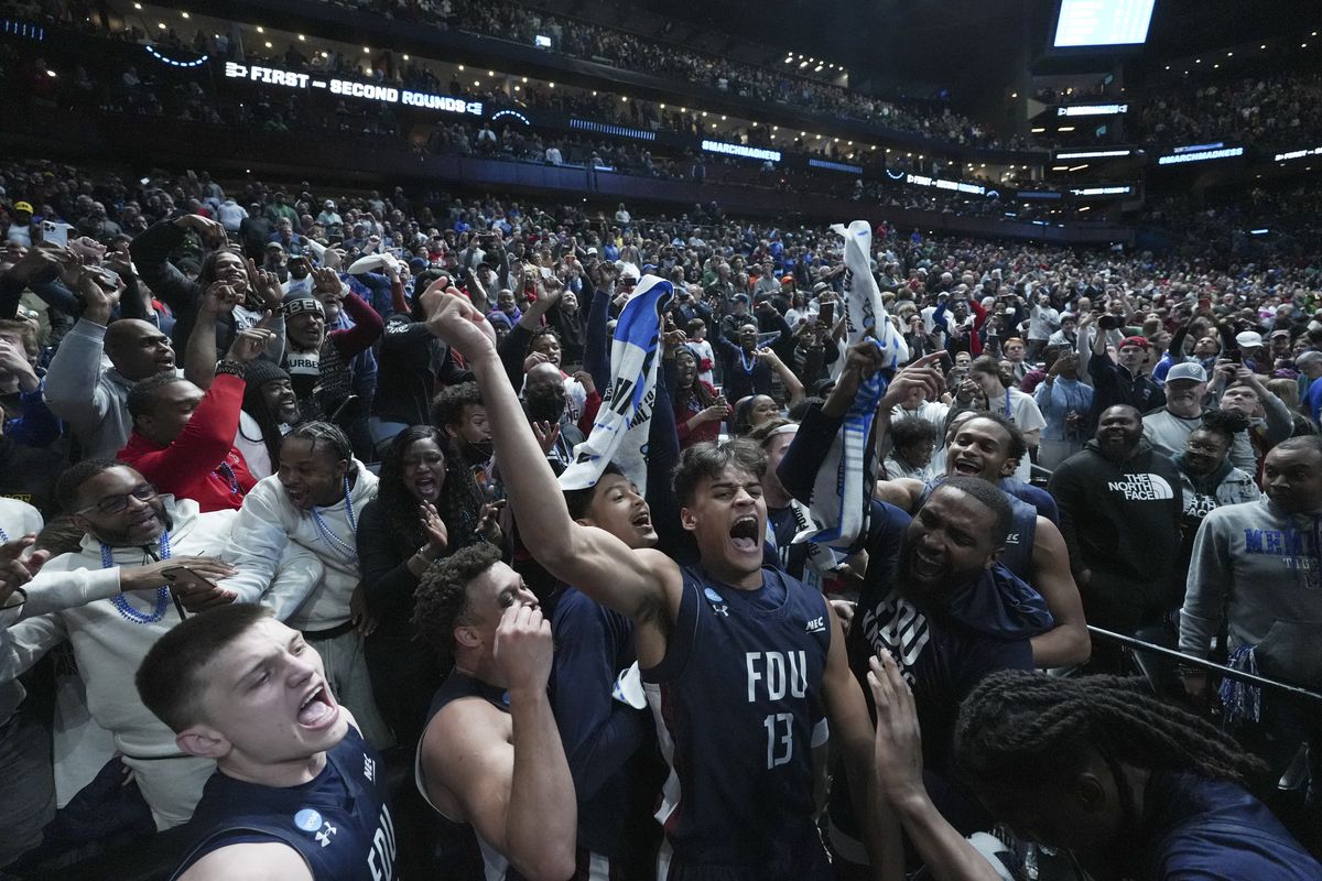 Jo’el Emanuel #13 of the Fairleigh Dickinson Knights celebrates with the crowd after beating the Purdue Boilermakers 63-58 in the first round of the NCAA Men’s Basketball Tournament at Nationwide Arena on March 17, 2023 in Columbus, Ohio.