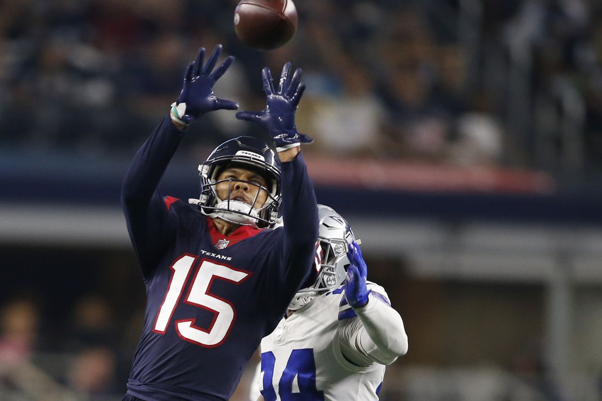 Houston Texans wide receiver Chris Moore (15) catches a pass against Dallas Cowboys cornerback Kelvin Joseph (24) in the fourth quarter at AT&amp;amp;T Stadium.