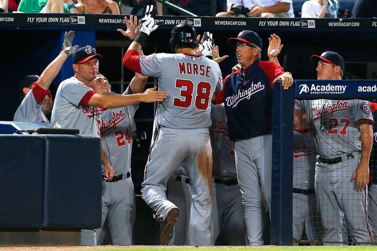 ATLANTA, GA - JUNE 29:  Michael Morse #38 of the Washington Nationals celebrates his solo homer in the eighth inning against the Atlanta Braves at Turner Field on June 29, 2012 in Atlanta, Georgia.  (Photo by Kevin C. Cox/Getty Images)