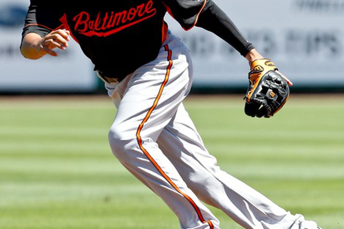 March 25, 2012; Clearwater, FL, USA; Baltimore Orioles shortstop Manny Machado in the field during the bottom of the first inning of a spring training game against the Philadelphia Phillies at Bright House Networks Field. 