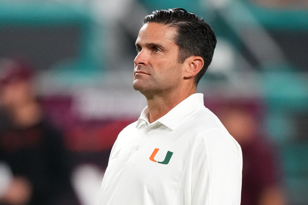 Miami Hurricanes head coach Manny Diaz stands on the field prior to the game against the Virginia Tech Hokies at Hard Rock Stadium.