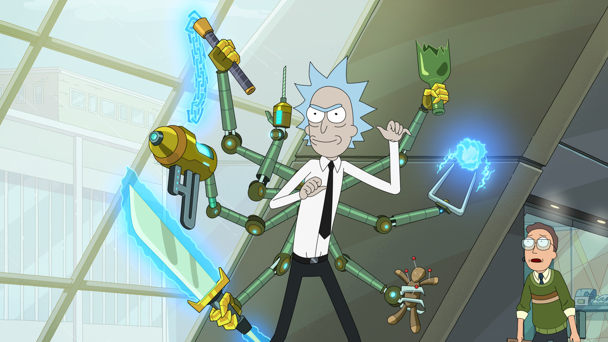 Rick stands and looks smug with a set of robotic arms holding things coming out of his back;  in the background Jerry looks shocked