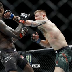 Israel Adesanya and Marvin Vettori tangle at UFC on FOX 29 fight.