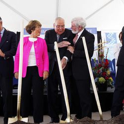 Dignitaries greet each other following a groundbreaking ceremony for the Primary Children's & Families' Cancer Research Center at Huntsman Cancer Institute in Salt Lake City on Friday, June 6, 2014. At center are Karen and Jon M. Huntsman and University of Utah President David W. Pershing . At left are Gov. Gary Herbert and Jon M. Huntsman Jr.