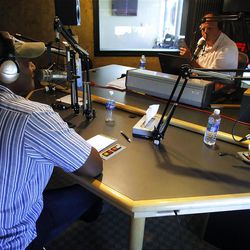 Former NBA player Karl Malone does his radio show at ESPN 700 studios with Hans Olsen Wednesday, June 20, 2012.