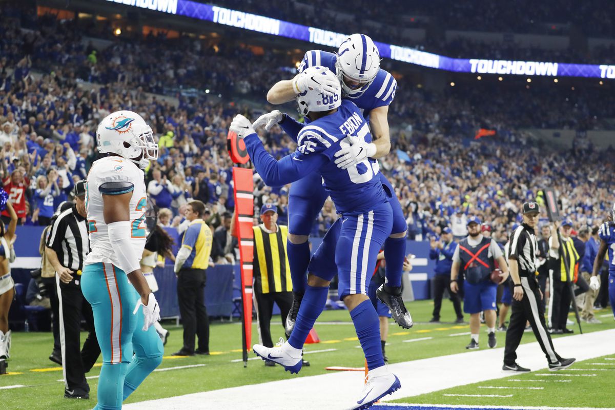 Indianapolis Colts tight end Eric Ebron after scoring a touchdown is congratulated by tight end Jack Doyle during the first quarter against the Miami Dolphins at Lucas Oil Stadium.